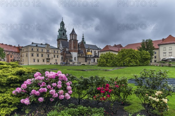 Wavelhügel with park and castle church when it rains, Krakow, Poland