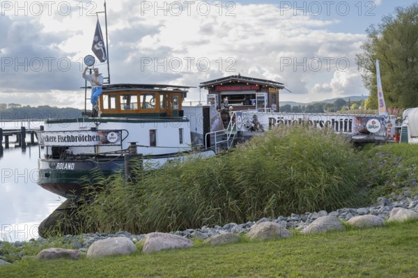 Smoking ship, restaurant ship on Lake Selliner, grass in front of the ship, Sellin, Baltic resort, Rügen island, Mecklenburg-Western Pomerania, Germany