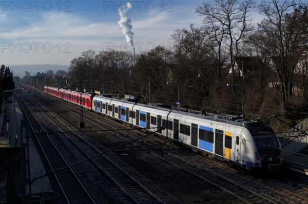 Display train omitted, S-Bahn, train, S2, class 420 in traffic red, and generation 2025 series, stops at platform, station Sommerrain, public transport, sky, blue, Stuttgart, Baden-Württemberg, Germany