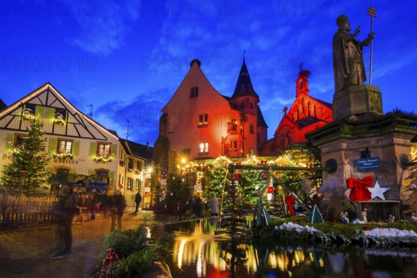 Houses illuminated and decorated for Christmas, Christmas market, blue hour, Eguisheim, Haut-Rhin department, Grand Est region, Alsace, France