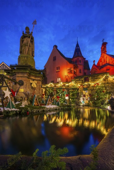 Houses illuminated and decorated for Christmas, Christmas market, blue hour, Eguisheim, Haut-Rhin department, Grand Est region, Alsace, France