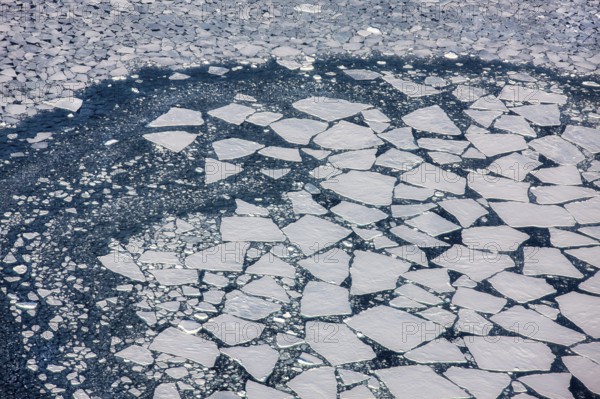 Aerial view of melting icepack in the East Greenland, Greenland (Kalaallit Nunaat), Arctic Ocean, climate change, global warming, geographically part of North America, politically part of the Kingdom of Denmark