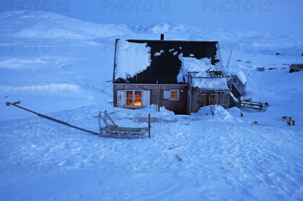 Tiniteqilaaq in a winter night, The village is one of five settlements around Ammassalik Island, located in the Sermersooq municipality on Ikasativaq Fjord, north of Ammassalik Island and facing Sermilik, Greenland, North America