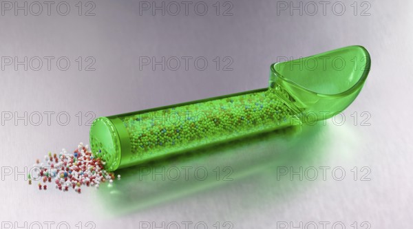 Green, transparent ice cream scoop filled with colored sugar sprinkles