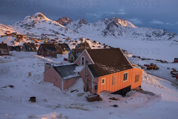 Sunrise at Tasiilaq (Angmagsalik in Inuit) a small village located on Ammassalik Island in the Irminger Sea, within the Sermersooq municipality, eastern Greenland, North America