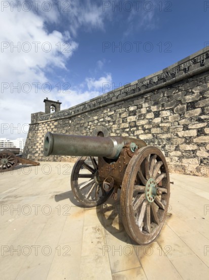 Castillo de San Gabriel fortress against blue sky with white clouds, Arrecife, Lanzarote, Canary Islands, Spain