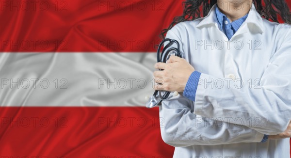 Healthcare professional with Austria flag background. Professional doctor holding stethoscope on Austria flag background