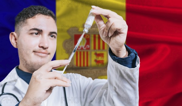 Doctor holding syringe on Andorra flag background. Medical professional holding syringe with Andorran flag in the background