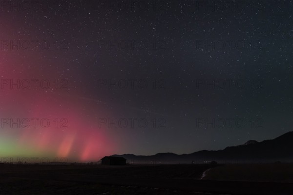 Northern lights, aurora borealis, solar storm, January 2026, red, green, hut, Loisach-Lake Kochel-Moore, view of Zwiesel, Benediktenwand, foothills of the Alps, Bavaria, Germany
