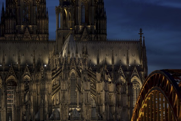 Evening atmosphere, Cologne Cathedral illuminated with LED lamps and the Hohenzollern Bridge, Cologne, North Rhine-Westphalia, Germany