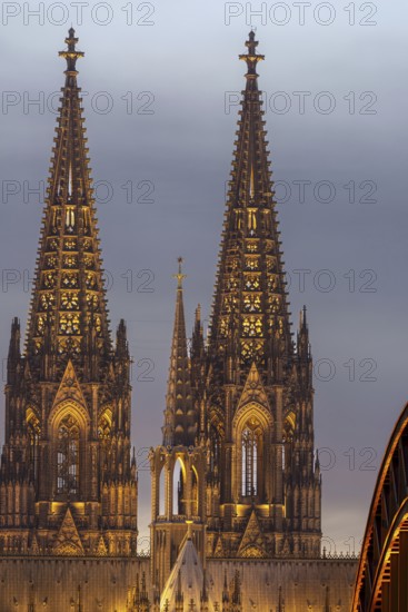Evening atmosphere, Cologne Cathedral illuminated with LED lamps and the Hohenzollern Bridge, Cologne, North Rhine-Westphalia, Germany