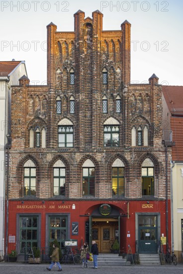 Historic brick Gothic buildings on the market square of the Hanseatic City of Greifswald, Mecklenburg-Western Pomerania, Germany, for editorial use only