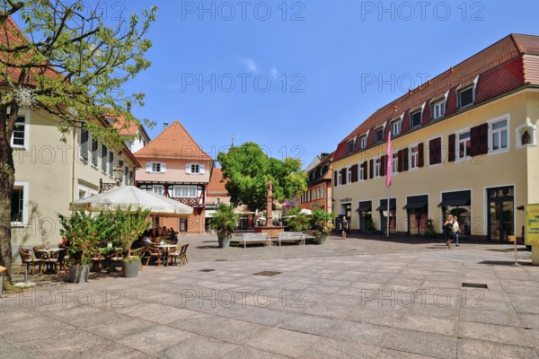Ettlingen, Germany - August 13th 2025: Fountain at Ettlingen Schlosplatz town square on a sunny day in Germany