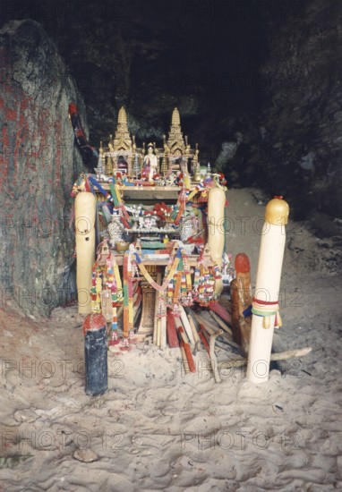 Wooden penises in a shrine on a beach in Krabi. In Thailand, the phallus (penis) is a symbol of luck and fertility. Buddha, Buddhism, Religion, Krabi, Southern Thailand, Thailand, Southeast Asia