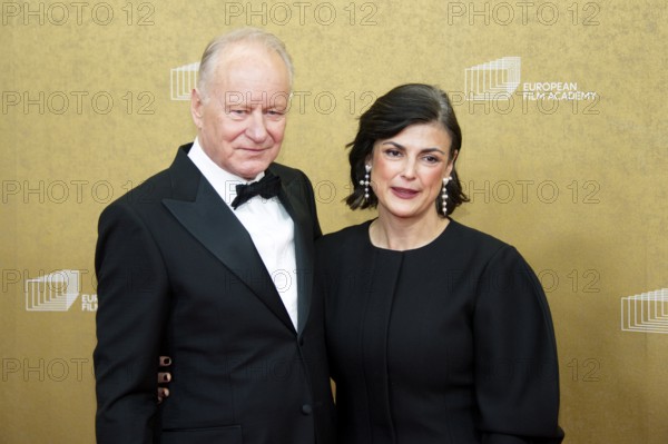 Stellan Skarsgard with woman Megan Everett, EUROPEAN FILM AWARDS Berlin 2026, photo call at the House of World Cultures, Berlin, 17.01.2026