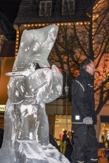 Eisbär, an ice sculpture created during Ice Carving Street Action as part of the long shopping night in downtown Reutlingen, Baden-Württemberg, Germany, for editorial use only