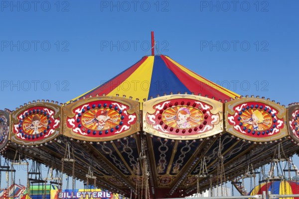 Close-up of carrousel amusement ride at Fun Show traveling amusement ride park, Old Port of Montreal, Quebec, Canada