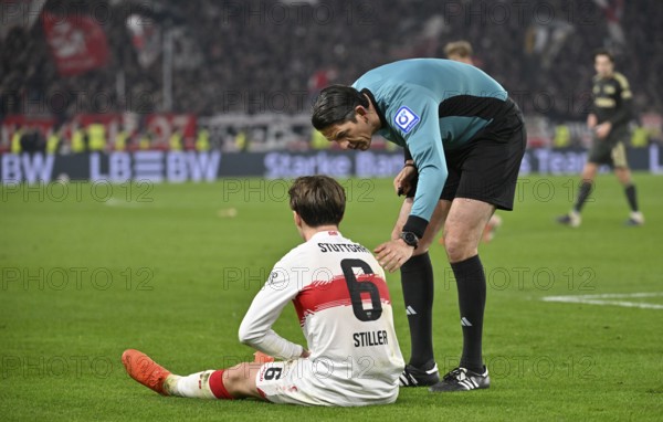 Referee Deniz Aytekin attends to Angelo Stiller VfB Stuttgart (06) injured Injury MHPArena, MHP Arena Stuttgart, Baden-Württemberg, Germany