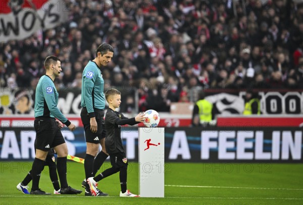 Start of a soccer Bundesliga game, shooting team led by referee Deniz Aytekin with ball child, ball boy, playing ball Adidas Derbystar from podium, MHPArena, MHP Arena Stuttgart, Baden-Württemberg, Germany