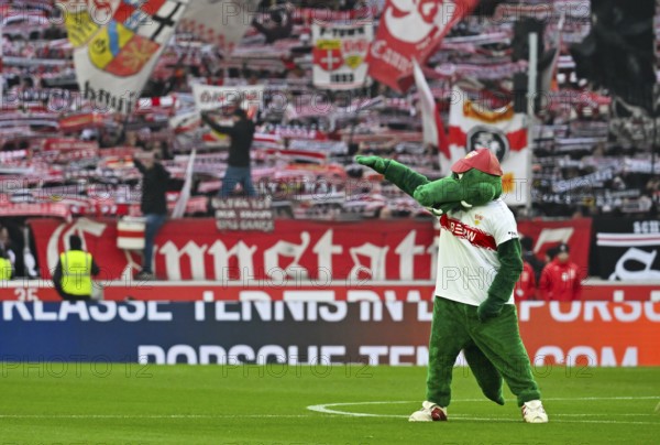 Mascot Fritzle VfB Stuttgart in front of fan block, fans, fan curve, flags, atmosphere, atmospheric Cannstatt curve VfB Stuttgart, MHPArena, MHP Arena Stuttgart, Baden-Württemberg, Germany