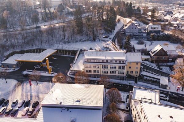 Snow-covered city view with modern buildings and roads in a wintry atmosphere, Nagold, Calw district, Black Forest, Germany