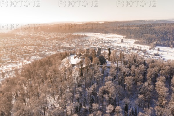 View of a winter landscape with a castle surrounded by snowy forests, Nagold, Calw district, Black Forest, Germany