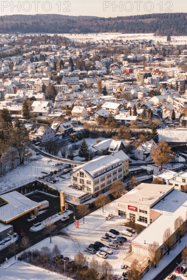 Snowy town with numerous buildings and roads, Nagold, Calw district, Black Forest, Germany