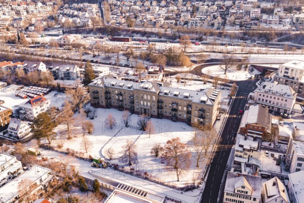 Snow-covered town with large buildings and a main road, Nagold, Calw district, Black Forest, Germany