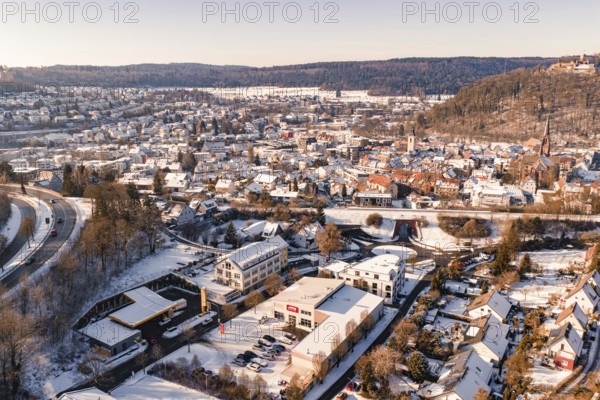 Extensive snow-covered town in winter with numerous houses, Nagold, Calw district, Black Forest, Germany