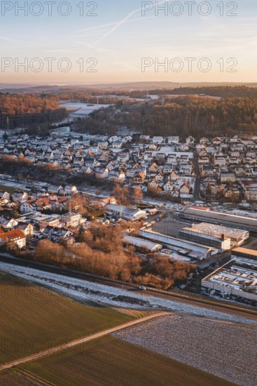 Wintery urban landscape with fields and roads at dawn, quiet atmosphere, Althengstett, Calw district, Germany