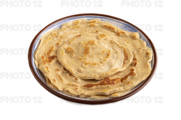 Stack of Plain Fried pancakes Isolated on white background. side view, close up