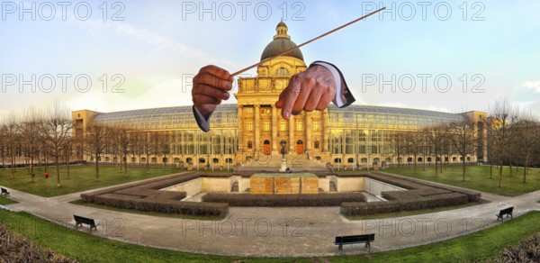 Conductors' hands in front of the Bavarian State Chancellery (StK), Who is conducting whom? The highest state authority established in Munich to support the Minister President and the state government. View from the west, in front of the equestrian statue of Otto I (1911) and war memorial (1928) . Munich, Bavaria, Germany