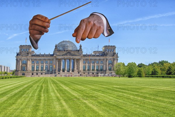 Conductor hands and Reichstag building. Who conducts whom here? Plenary area Reichstag building, unofficially also Bundestag or Wallot-Bau, on Republic Square in Berlin, seat of the German Bundestag since 1999. Since 1994, the Federal Assembly has also met here to elect the German Federal President. berlin