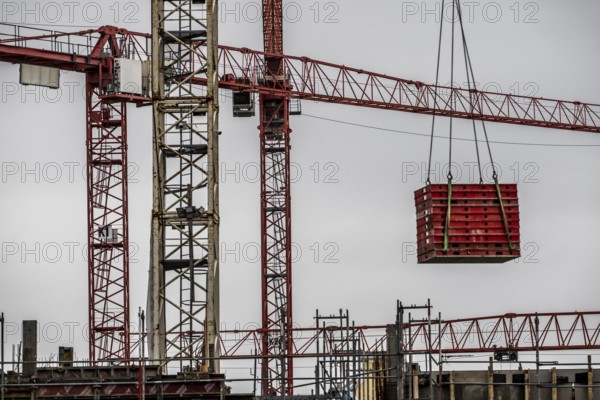 Construction site, a major construction project, apartments and commercial premises, symbolic image of the construction industry