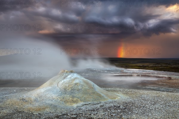 Thunderstorm and rainbow over the Hveravellir geothermal area with natural hot springs and fumaroles, located in the Kjölur Highlands between the Langjökull and Hofsjökull glaciers, along Route 35, Iceland