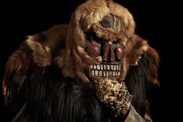 Portrait of traditional hand-carved wooden mask from the Loetschental Carnival, representing folkloric characters, spirits, and demons, Loetschental village, Valais Canton, Switzerland