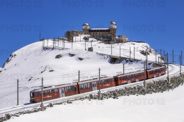 The Gornergrat Railway connects Zermatt to the summit of Gornergrat (3, 089 m) in winter, located in the Valais canton, Swiss Alps, Switzerland