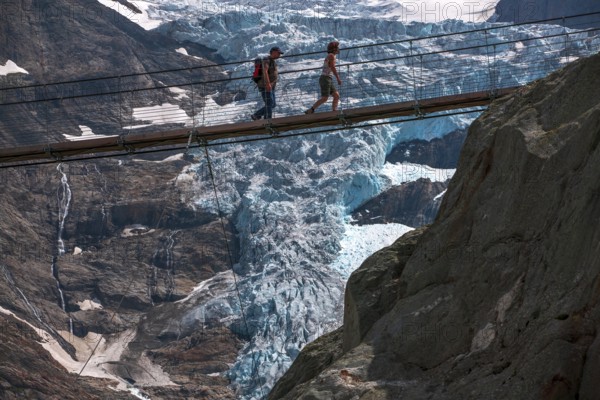 Trift Footbridge, a pedestrian suspension bridge built to replace a hiking path destroyed by glacial retreat, located near the Trift Glacier, Climate Change, Global warming, Gadmen, Canton of Bern, Switzerland