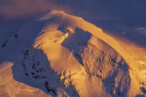 Pollux (4, 092?m -13, 425?ft) at sunset in winter, a peak in the Pennine Alps on the border between Switzerland and Italy, Zermatt region, Zermatt, Valais Canton, Switzerland