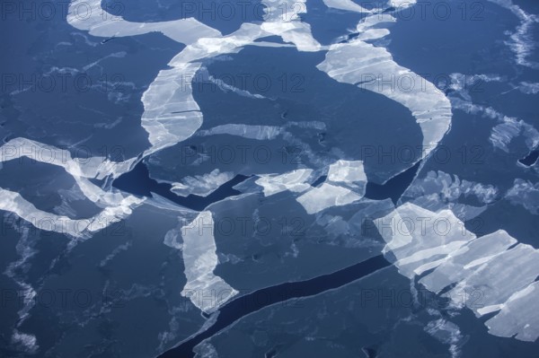 Melting pack ice, Arctic ocean, visible impact of climate change, Aerial view, Arctic, Greenland, Geographically in North America, politically part of the Kingdom of Denmark