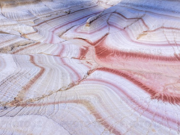 Sunset at Kyzylkup Hills (Tiramisu), colorful layered rock formations with red and white bands, Mangystau Region, Kazakhstan, Asia