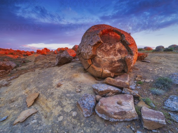 Sunset at Torysh Valley, the Valley of Balls, with thousands of natural spherical rock formations (concretions) scattered across the steppe, Mangystau Region, near Shetpe, Kazakhstan, Asia