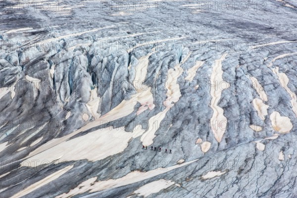 The Rhône Glacier, Mountaineers on a glacier, Furka pass, Goms valley, Oberwald, Swiss Alps Valais, Switzerland