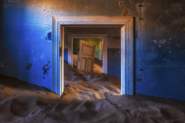 Sand dunes inside the houses of Kolmanskop ghost town, Karas Region, Namibia