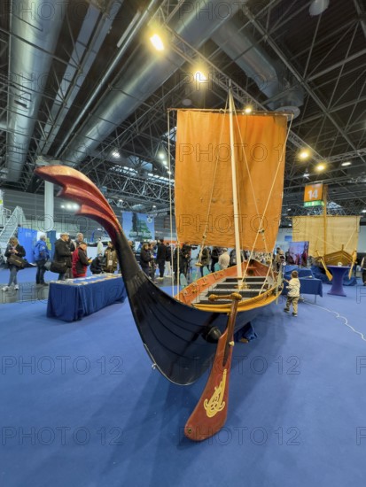 Press photo of replica Viking ship Viking boat sailing ship, large rudder blade in the middle of the picture, Messe boot Düsseldorf, North Rhine-Westphalia, Germany