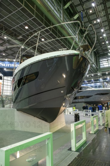 Press photo View of elegant bow of luxury yacht luxurious Sunseeker motor yacht in exhibition hall of Messe Düsseldorf boot, Düsseldorf, North Rhine-Westphalia, Germany