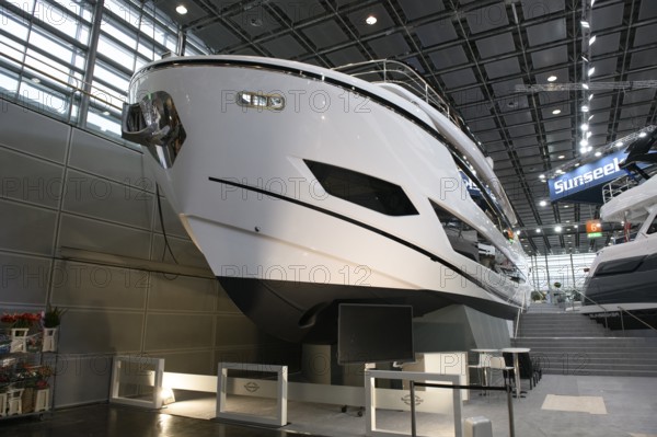 Press photo View of luxury yacht luxurious motor yacht Sunseeker yacht in exhibition hall of Messe Düsseldorf boot, Düsseldorf, North Rhine-Westphalia, Germany