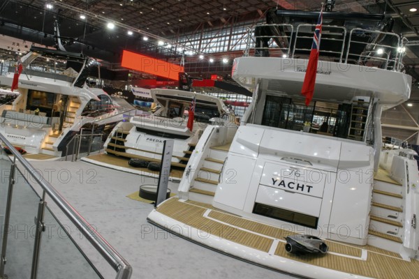 Press photo View of the stern of three luxury yachts Sunseeker luxury motor yachts in the exhibition hall of Messe Düsseldorf boot, Düsseldorf, North Rhine-Westphalia, Germany