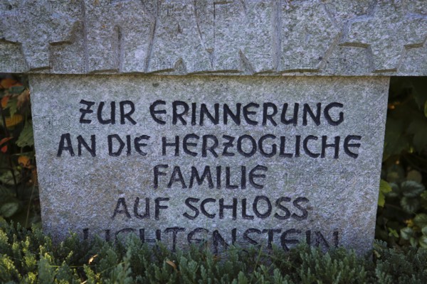 Memorial, detail, memorial stone in memory of the ducal family at Lichtenstein Castle, coat of arms, stone tablet, inscription, letters, cemetery of Großengstingen, writing, letters, albplateau above the Albtrauf, Großengstingen, municipality of Engstingen, district of Reutlingen, Swabian Alb, Baden-Württemberg, Germany
