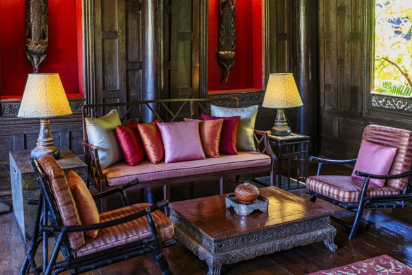 Jim Thomson house and museum, living room decorated with colored silk cushions, Bangkok, Thailand's metropolis, Thailand